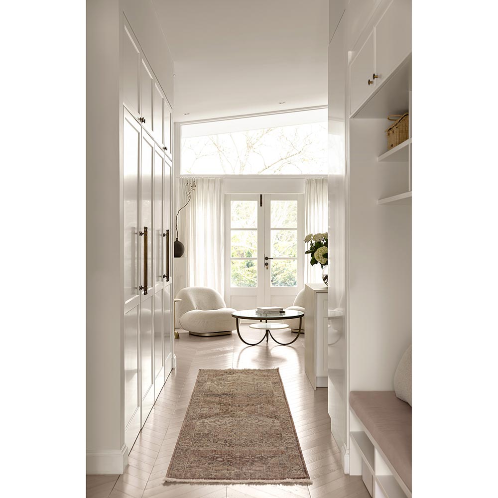 Darren Palmer Heirloom Runner in Plum in a hallway leading to a lounge room at House