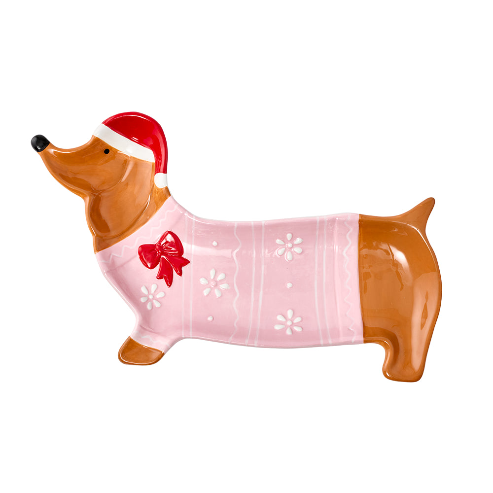 The Santas Workshop Dachshund serving platter, featuring a dachshund wearing a pink coat and a Santa hat.