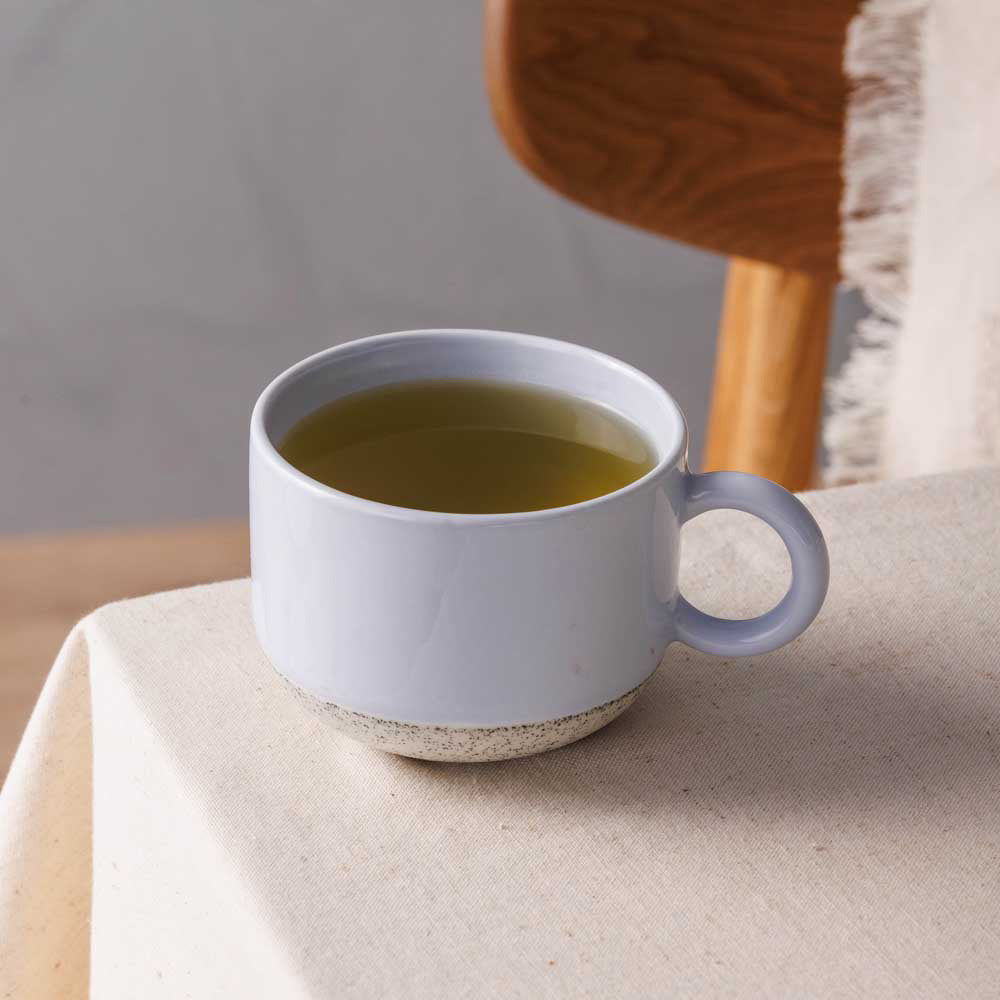 Ecology Hull Stoneware Mug 340ml in Blue on dining table at House