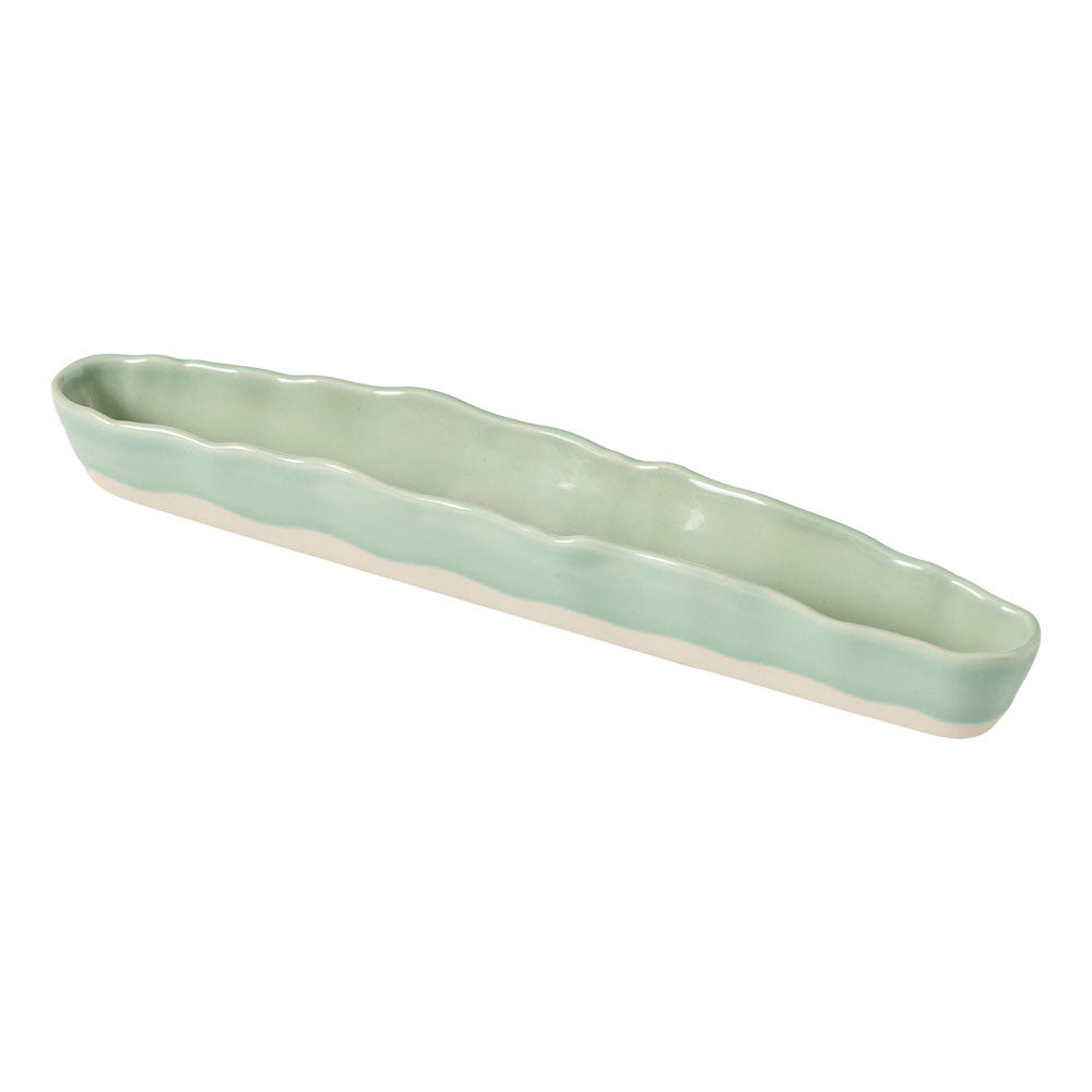 The Ecology Selvedge little long dish is a long and skinny serving platter with a glossy finish