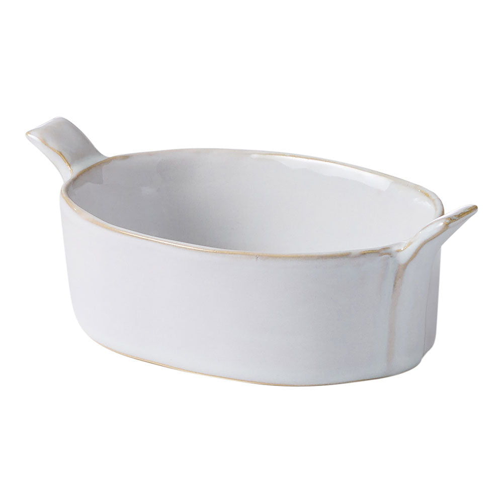The Ecology Fieldstone serving platter in quartz is designed with depth and side handles to easy serving.