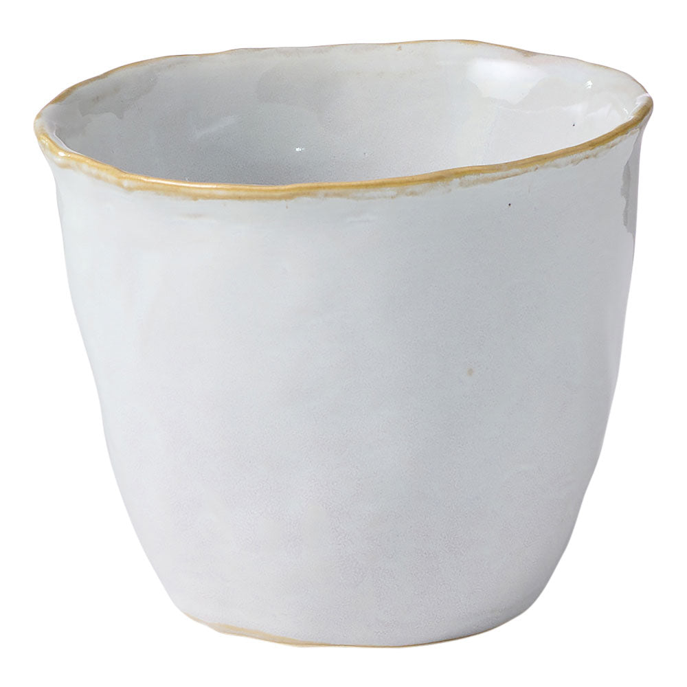 The Fieldstone quartz planter features a white glossy finish perfect for versatile styling.