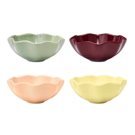 The Ecology set of 4 dips bowls featuring a ruffles design on the edges and four different colours including, sage, elderberry, peach and lemon.