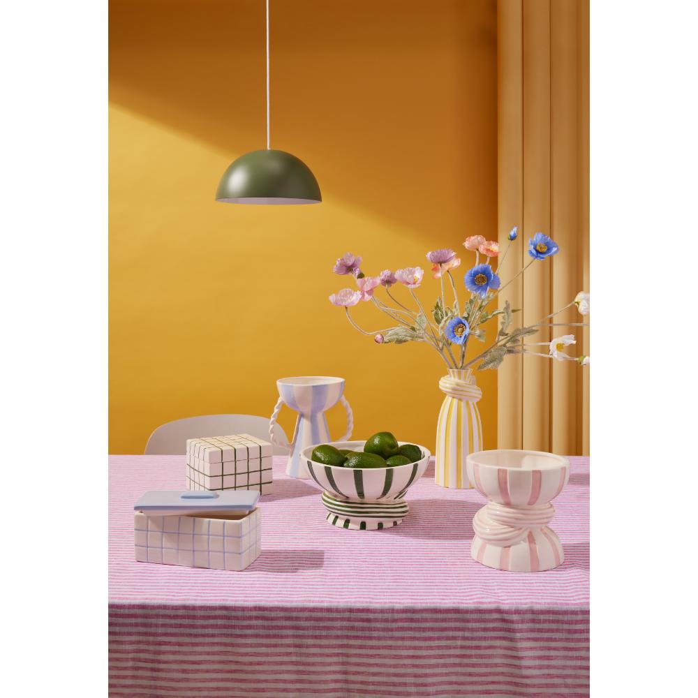 Emporium Lulu Collection - various sized ceramic vases, boxes, and bowls on pink and white tablecloth at House
