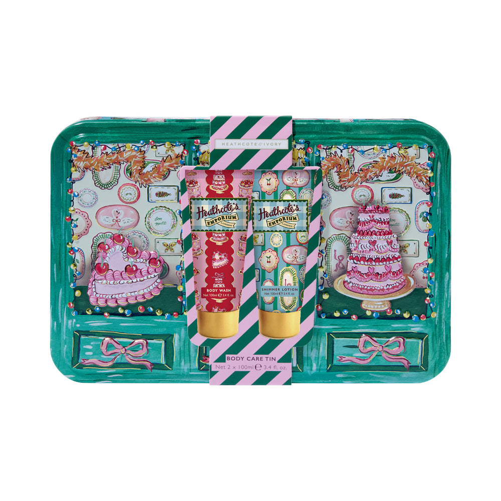 Body cream and body wash gift set presented in a patterned tin.
