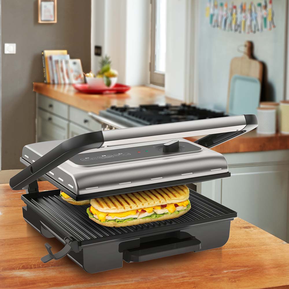 sandwich in a grill press on the kitchen counter - House