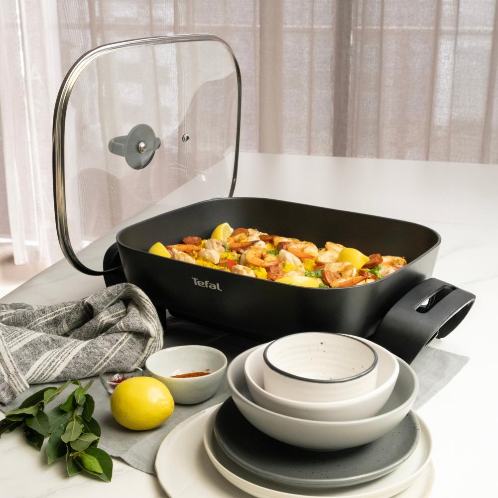 Electric Frypan on the kitchen counter filled with stir fry - House