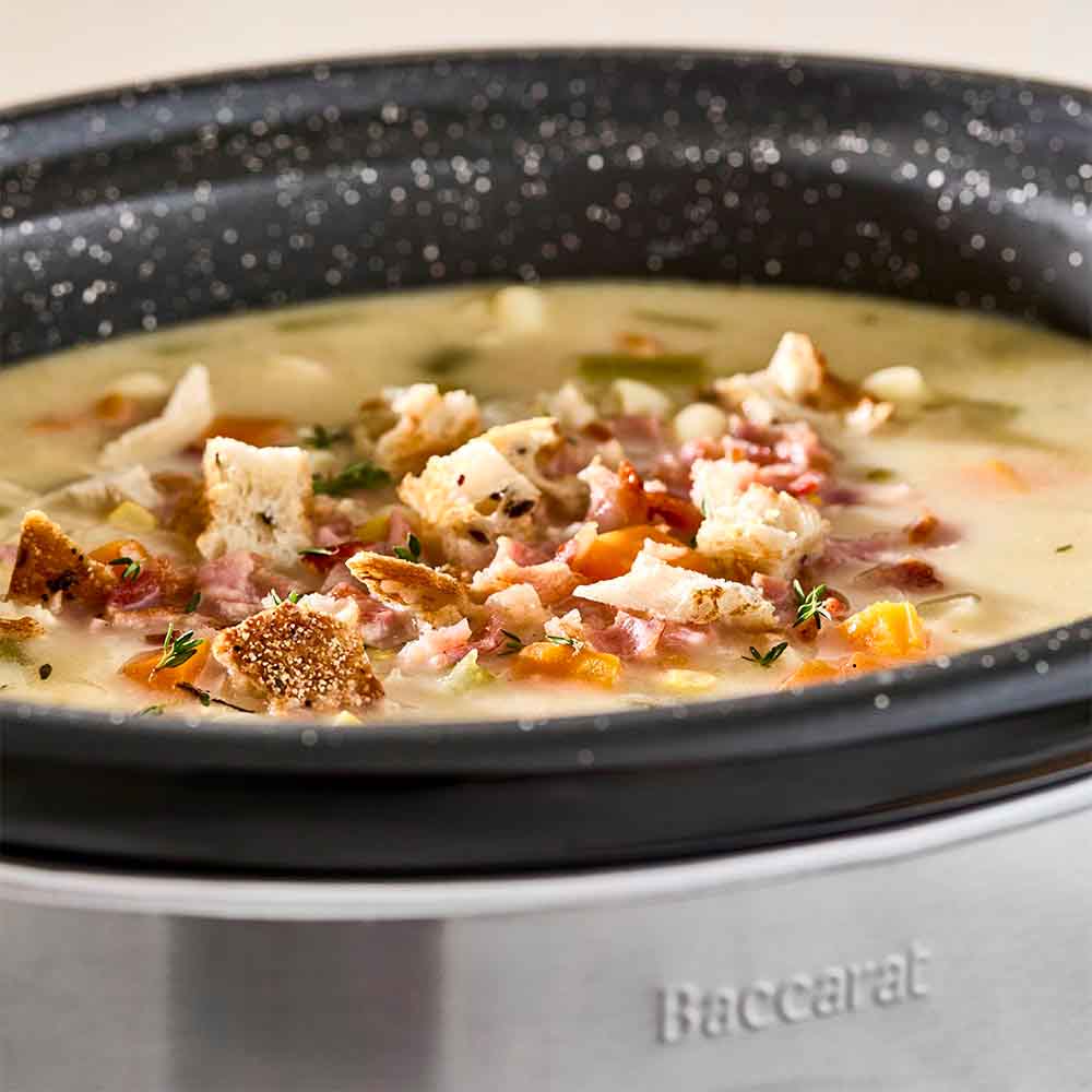 Baccarat The Tasty Chef 6L Slow Cooker at House. Close up shot of soup in a slow cooker.