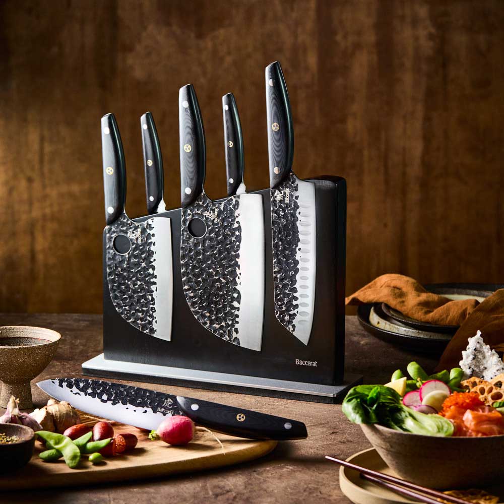 Baccarat KUROI KIBA 7 Piece Knife Block on wooden bench with vegetables at House