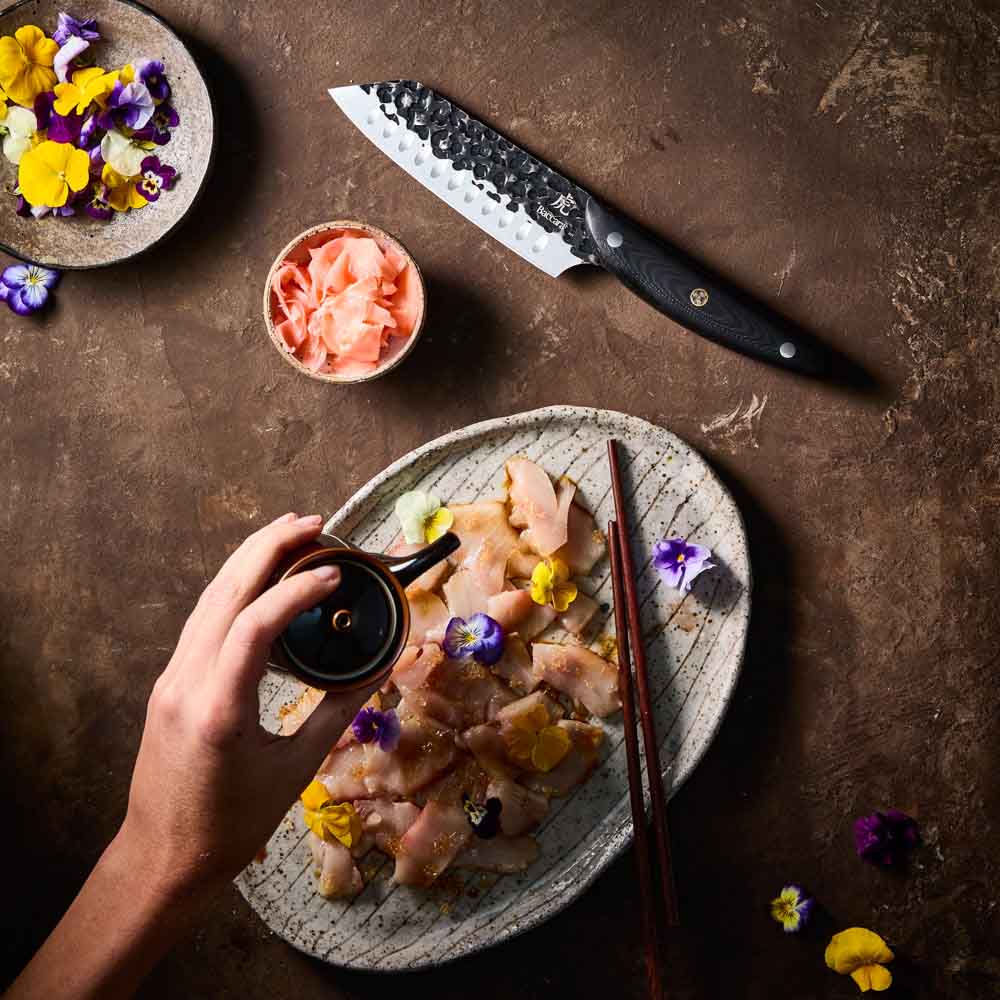 Woman pouring sauce on sashimi - Baccarat KUROI KIBA Santoku Knife 14cm at House