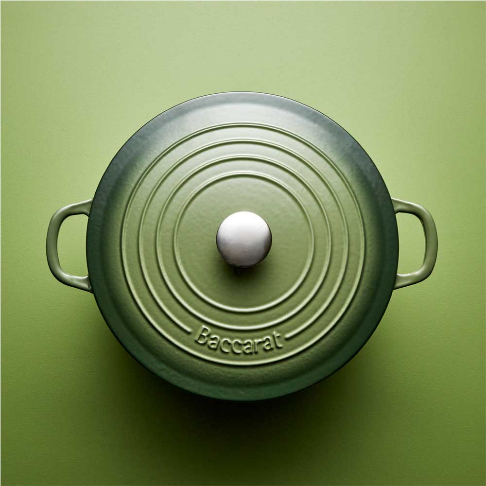 green dutch french oven in green background - House