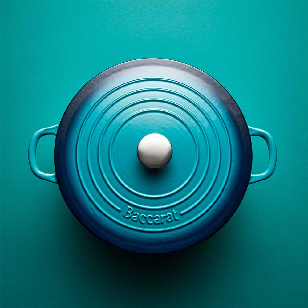 cast iron blue dutch oven with blue background - House