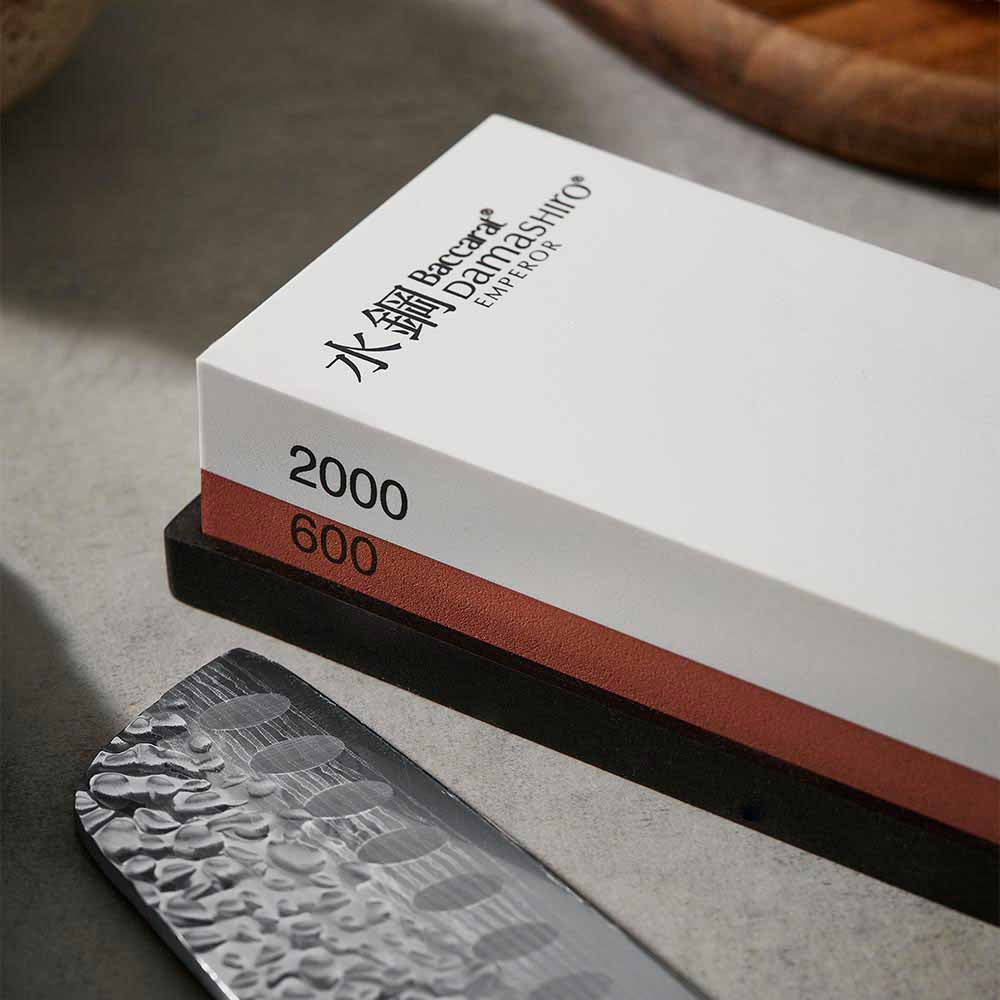 Close up of 600/2000 whetstone and santoku knife - House
