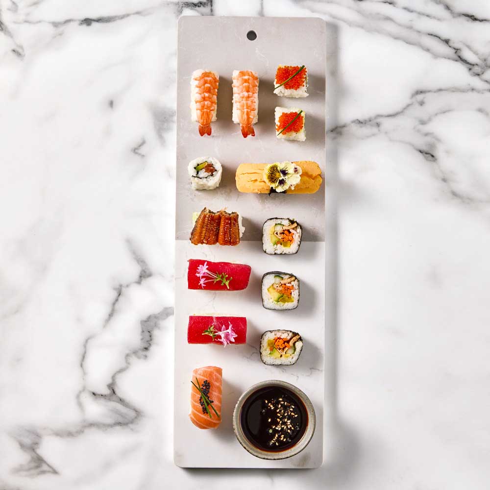sushi platter on long marble serving board - House