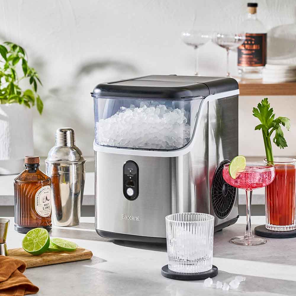 Nugget Ice Maker surrounded by glasses and barware