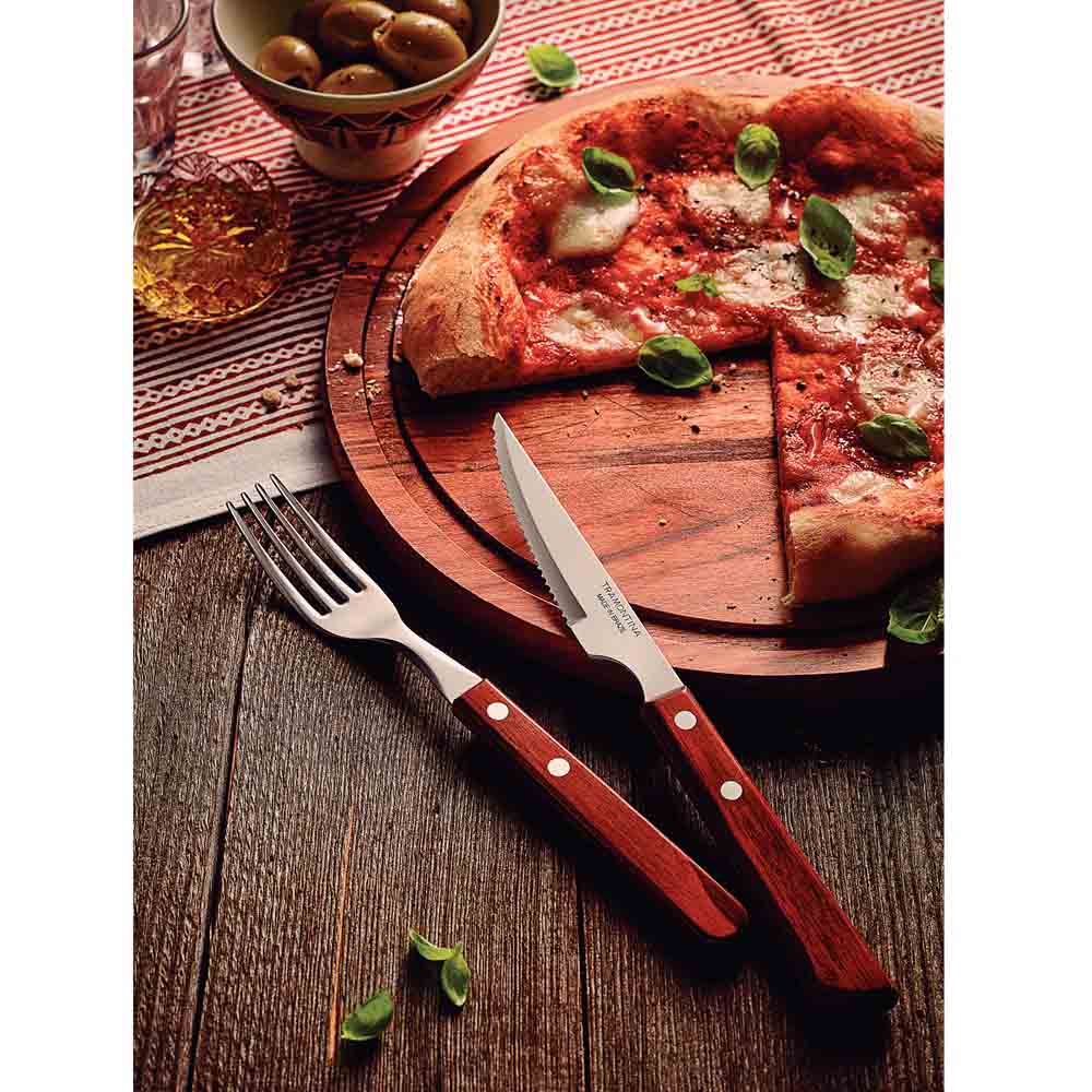 steak knife and fork set with pizza on wooden paddle - House