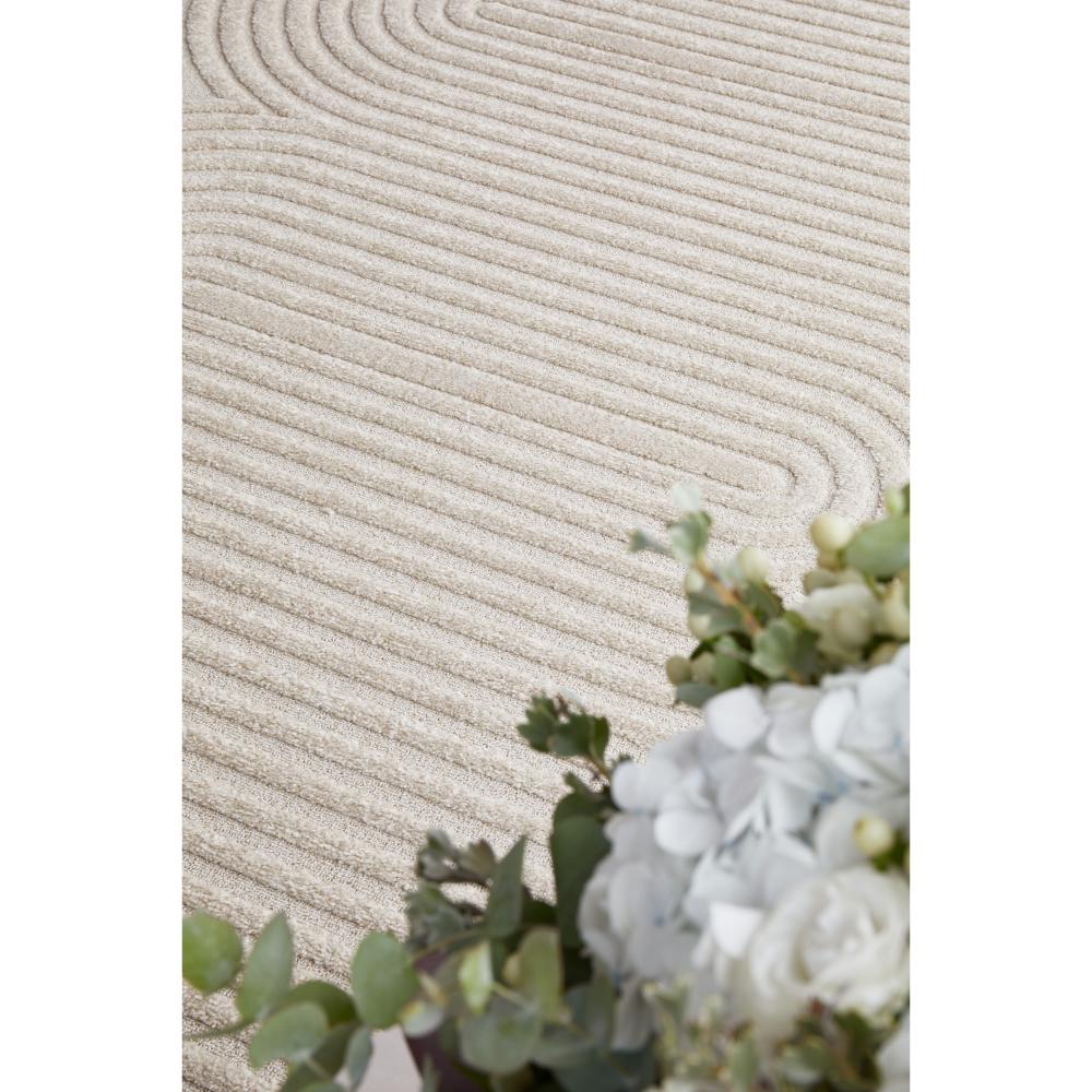 Rug Culture Lotus Carl Rug in beige at House. Rug with oval detail.