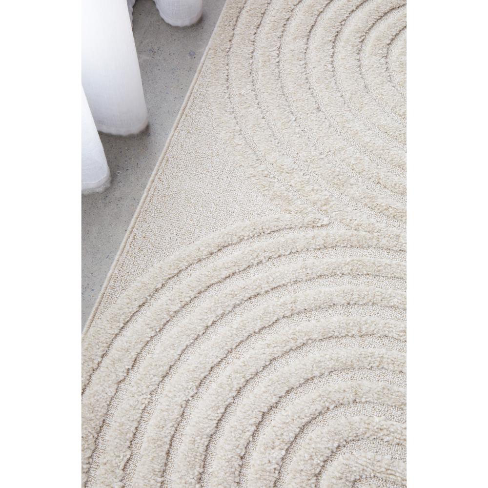 Rug Culture Lotus Carl Rug in beige at House. Rug with oval detail.