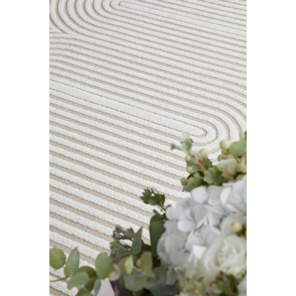 Rug Culture Lotus Carl Rug in mixed beige and white at House. Rug with oval detail.