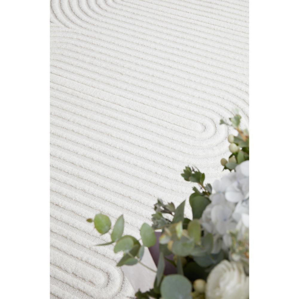 Rug Culture Lotus Carl Rug in white at House. Rug with oval detail.