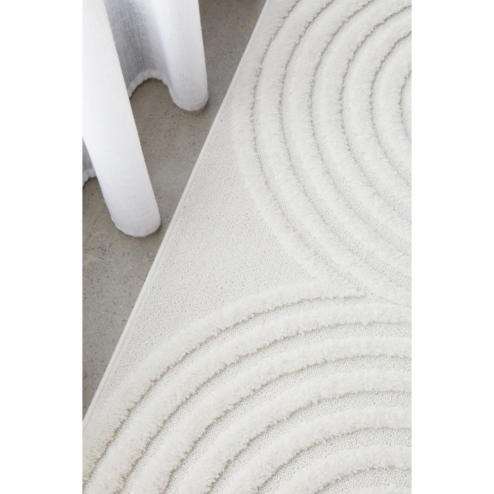 Rug Culture Lotus Carl Rug in white at House. Rug with oval detail.