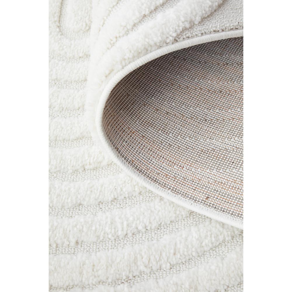 Rug Culture Lotus Carl Rug in white at House. detail shot of Rug with oval detail.