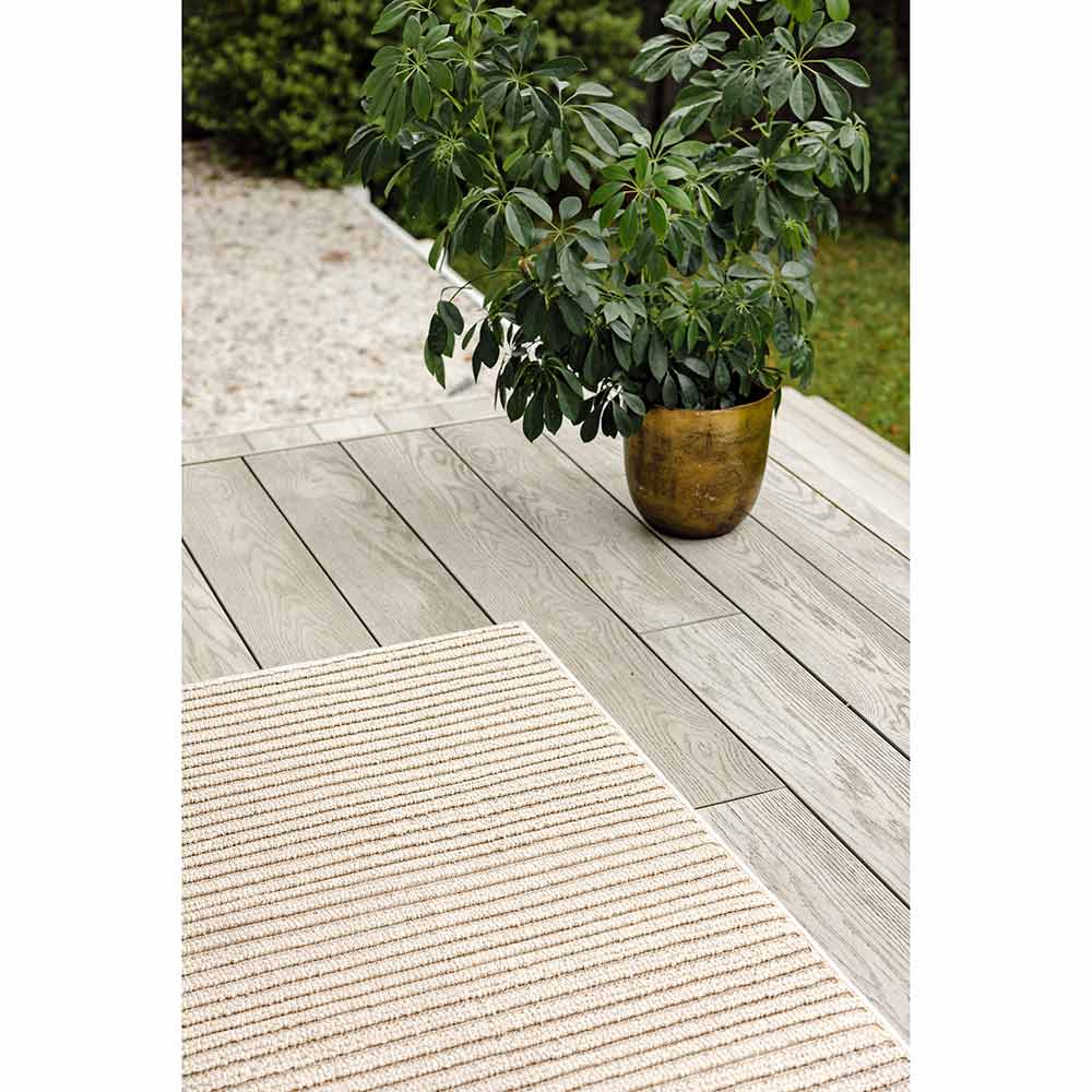 Darren Palmer Sandridge Indoor/Outdoor Rug in Taupe on outdoor patio at House
