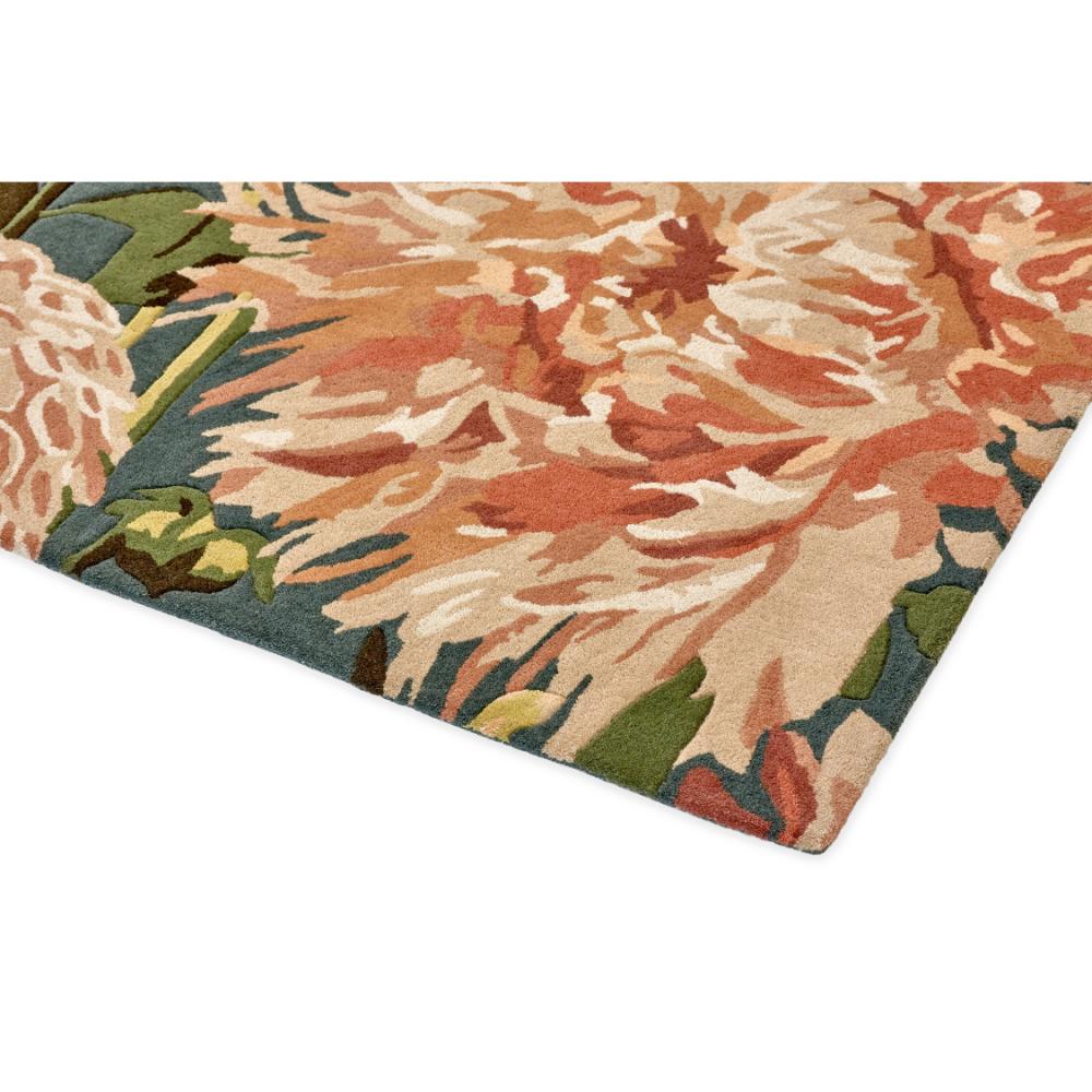 designer large orange dahlia flower wool rug detail shot - House