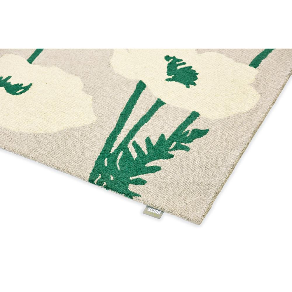 beige wool rug with cream poppies detailed image - House