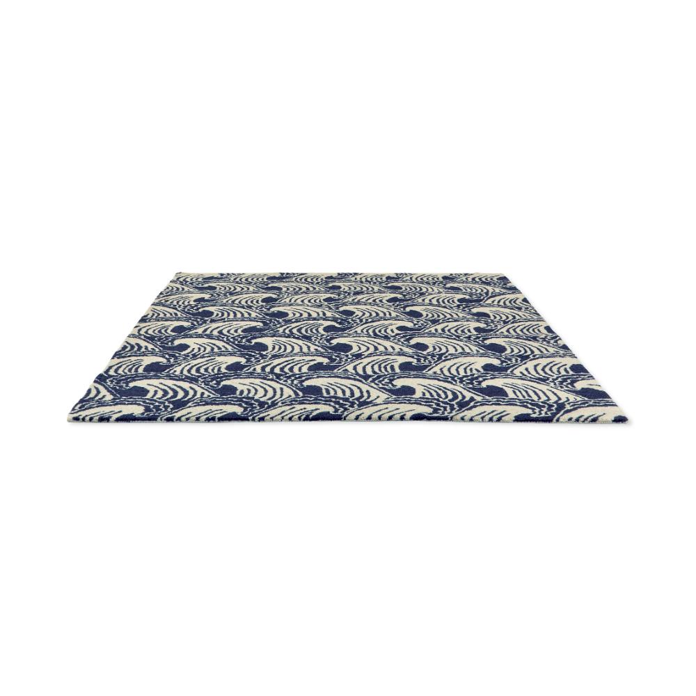 Blue wave print wool rug angled image - House