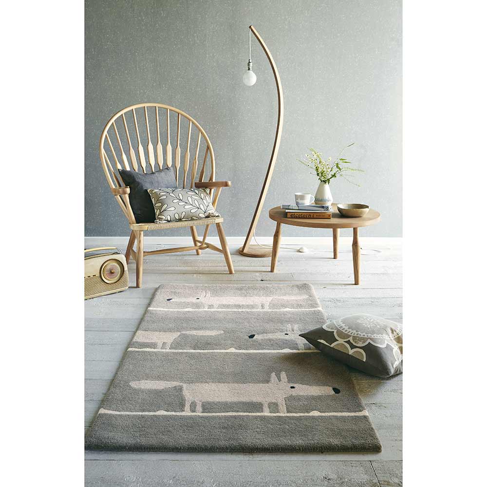 grey and white fox print wool rug in sitting area - House