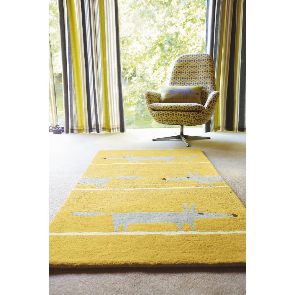 grey and yellow fox print wool rug with yellow armchair - House
